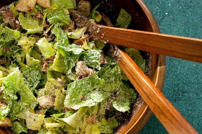 Vegan Caesar Salad Dressing + Crouton Recipe Homemade Vegan Caesar Salad in Wooden Bowl | Vitacost.com/Blog
