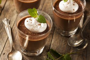 Chocolate Mouse Topped with Cream and Mint on Wooden Table | Vitacost Blog