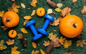 Dumbbells & Pumpkins on Grass With Leaves are Perfect Fall Fitness Accessories – Get the Themed Workout Today | Vitacost.com/blog