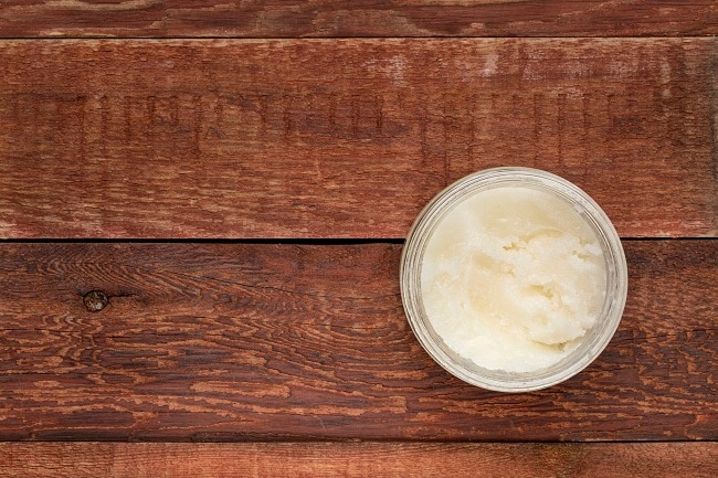 Glass Jar Filled with Coconut Oil on Wood Table | Vitacost.com/Blog