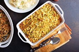 Top View of Stuffing in Baking Dish on Wooden Cutting Board | Vitacost Blog