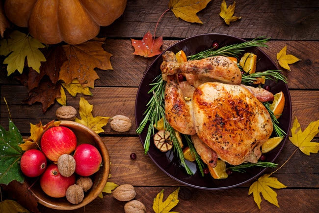 Autumn-Themed Table Showing the Best Way to Cook A Turkey by Oven-Roasting With Fresh Herbs | Vitacost.com/blog
