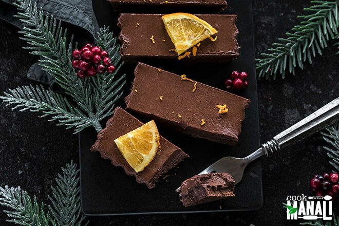 vegan chocolate tart with orange slices on top
