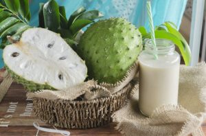 Arrangement of Soursop Fruit and Juice in Tropical Setting to Represent Foods That Reduce Inflammation | Vitacost.com/blog