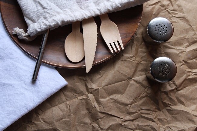 How to Reduce Waste & Ditch Single-Use Plastic  Cotton Bag Filled with Bamboo Utensils and Stainless Steel Straw | Vitacost.com/Blog
