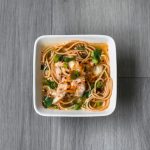 Top View of Square White Bowl of Kimchi Soup on Gray Wood | Vitacost Blog