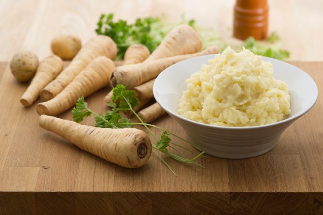 Mashed Parsnips  Bowl of Parsnip Mash Next to Raw Parsnips | Vitacost Blog