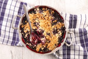 Top View of Blueberry Cobbler on Checkered Cloth | Vitacost Blog