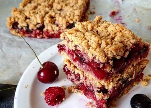 Stack of Homemade Protein Bars with Berry Filling