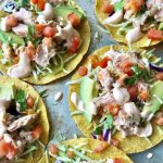 salmon tostadas on baking sheet