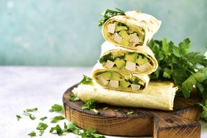 Chicken and Avocado Wraps Next to Fresh Cilantro | Vitacost Blog