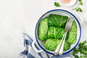 Stuffed and Rolled Cabbage in Bowl on White Background | Vitacost Blog