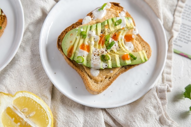 Buffalo Hummus Avocado Toast on White Plate | Vitacost.com/blog