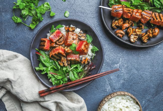 Grilled Ahi Tuna & Cremini Mushroom Bowl  Top View of Seared Tuna and Mushrooms on Rice and Greens | Vitacost Blog