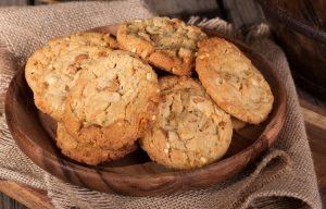 No-Sugar Peanut Butter Pecan Sandies in Brown Bowl on top of Burlap | Vitacost.com/blog
