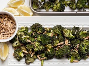 Roasted Broccoli and Almonds with Balsamic Reduction on White Serving Platter | Vitacost.com/blog