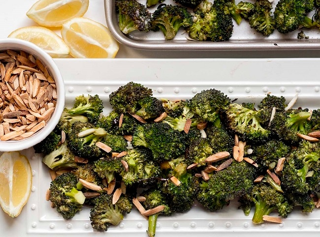 Roasted Broccoli and Almonds with Balsamic Reduction on White Serving Platter | Vitacost.com/blog