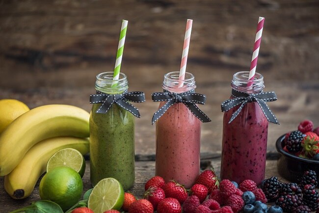 3 Easy Smoothies in Glass Jar with Scattered Fruits | Vitacost.com/blog