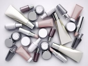 Overhead View of Assortment of Unlabeled Health and Beauty Products on Table to be Disposed of Following Recycling Guidelines | Vitacost.com/blog