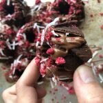 Person holding a mini chocolate bundt cake
