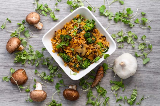 Top View Rice Bowl with Broccoli, Mushrooms and Sprouts on Gray | Vitacost Blog