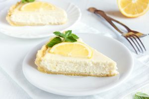 Slice of Lemon Cheesecake on White Plate | Vitacost.com/blog