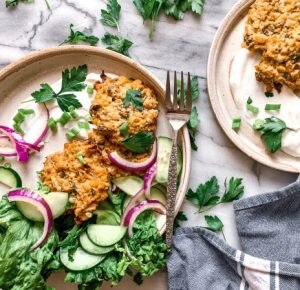 Chickpea Fritters with Cucumber and Onion Salad On White Granite | Vitacost Blog