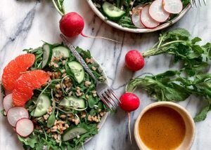 Top View of Green Salads with Grapefruit and Radishes on Marble | Vitacost Blog
