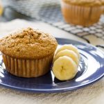 Banana Bread Muffin on Blue Plate with Sliced Bananas | Vitacost.com/blog