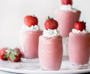 Strawberry Mousse in Glass Jars with Whipped Coconut Cream and Fresh Strawberries | Vitacost.com/blog