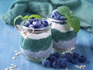 Layered Spirulina Chia Parfait Topped with Blueberries
