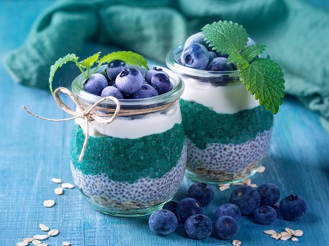 Blueberry Chia Parfait with Spirulina Layered Spirulina Chia Parfait Topped with Blueberries