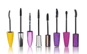 How to Use Mascara Represented by Various Colored Wands From Natural Beauty Brands in Row Against White Background | Vitacost.com/blog