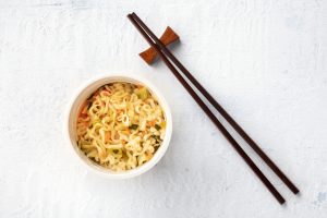 Top View of Bowl of Noodles Next to Chopsticks | Vitacost Blog