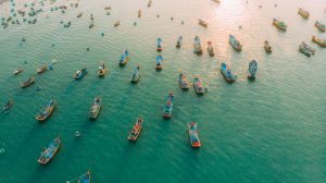 Group of boats gathered together for sustainable fishing