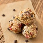 Rolled oats, cranberries and chocolate chips in a dessert ball