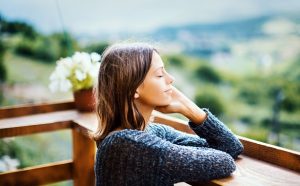Woman Smiling as a Result of Positive Self-Talk | Vitacost.com/Blog