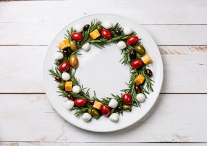 Appetizer Wreath Made From Olives, Tomatoes and Cheese Cubes as Example of Creative Rosemary Uses for the Holidays | Vitacost.com/blog
