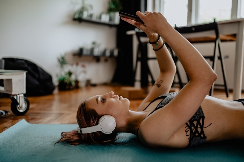 Yogi Wearing Headphones Listening to Guided Meditation Audio Gift | Vitacost.com/Blog