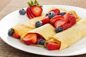 Gluten-Free Crepes on Plate Topped with Fruit | Vitacost.com/blog