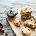 Chocolate Chip Cookies Stuffed with Chocolate Sauce on Cutting Board | Vitacost Blog