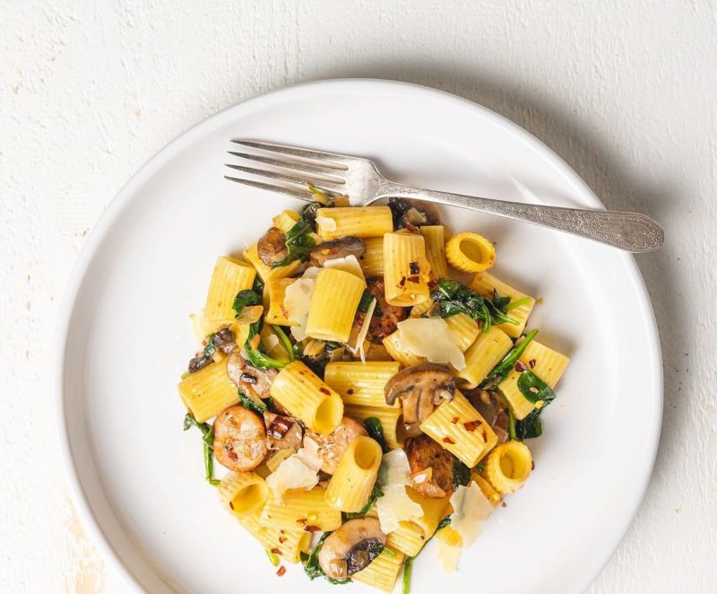 Top View of Pasta, Sausage and Mushrooms on White Plate | Vitacost Blog