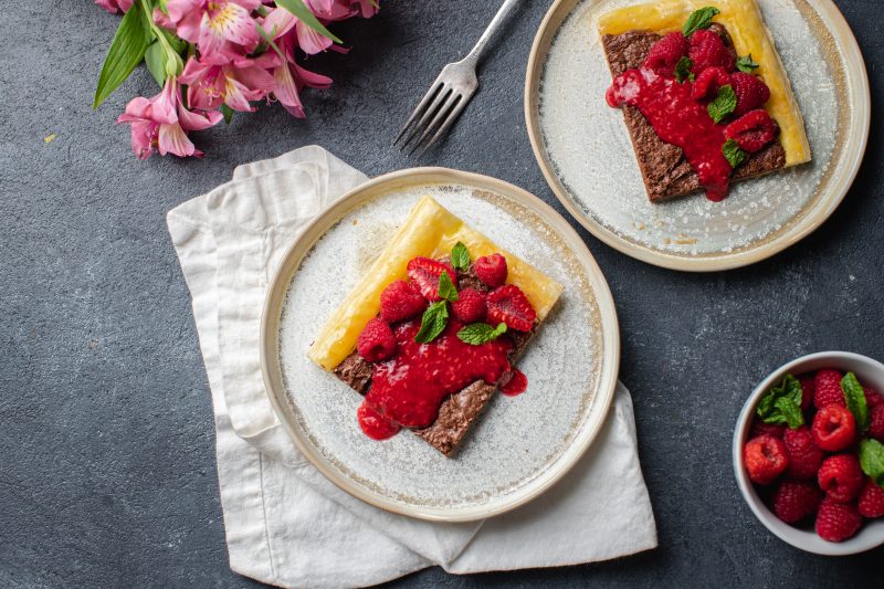 Top View of Pastry Topped with Fresh Raspberries and Red Sauce | Vitacost Blog