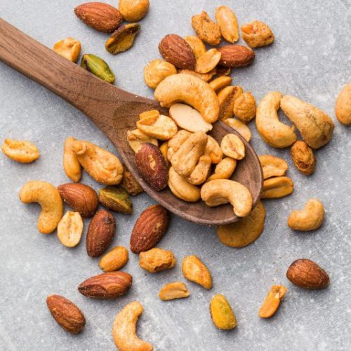 Wooden Spoon Overflowing With Mixed Nuts | Vitacost Blog