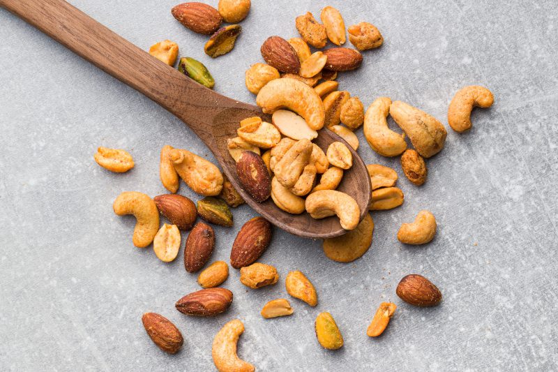Wooden Spoon Overflowing With Mixed Nuts | Vitacost Blog