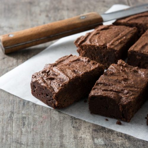 Close Up of Dense Brownies on Wax Paper | Vitacost Blog