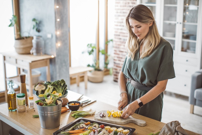 Naturopathic Doctor Preparing Food in Kitchen With Products for Maintaining a Healthy Lifestyle From Vitacost.com | Vitacost.com/blog