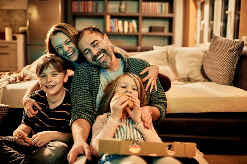 Young Family at Home Playing and Snacking Together | Vitacost.com/Blog