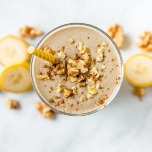Top View of Banana Smoothie Garnished with Walnuts | Vitacost Blog