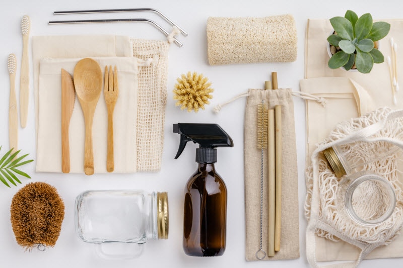 Concept of What is Green Cleaning Represented by Overhead View of Assorted Natural Cleaning Supplies on White Surface | Vitacost.com/blog